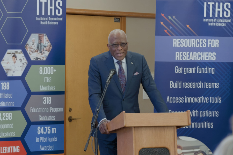 President Jones speaking at a podium