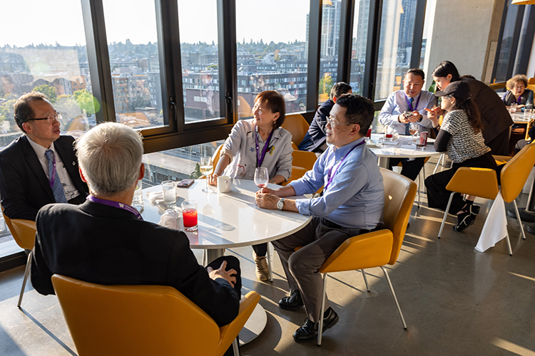Event attendees sitting at tables